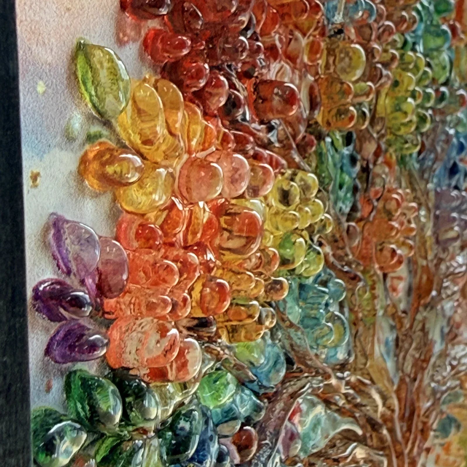Close view of raised colourful Rilavere artwork details