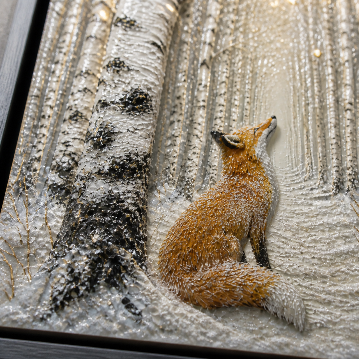Close-up of the fox, snow-covered ground, birch bark, and winter light.