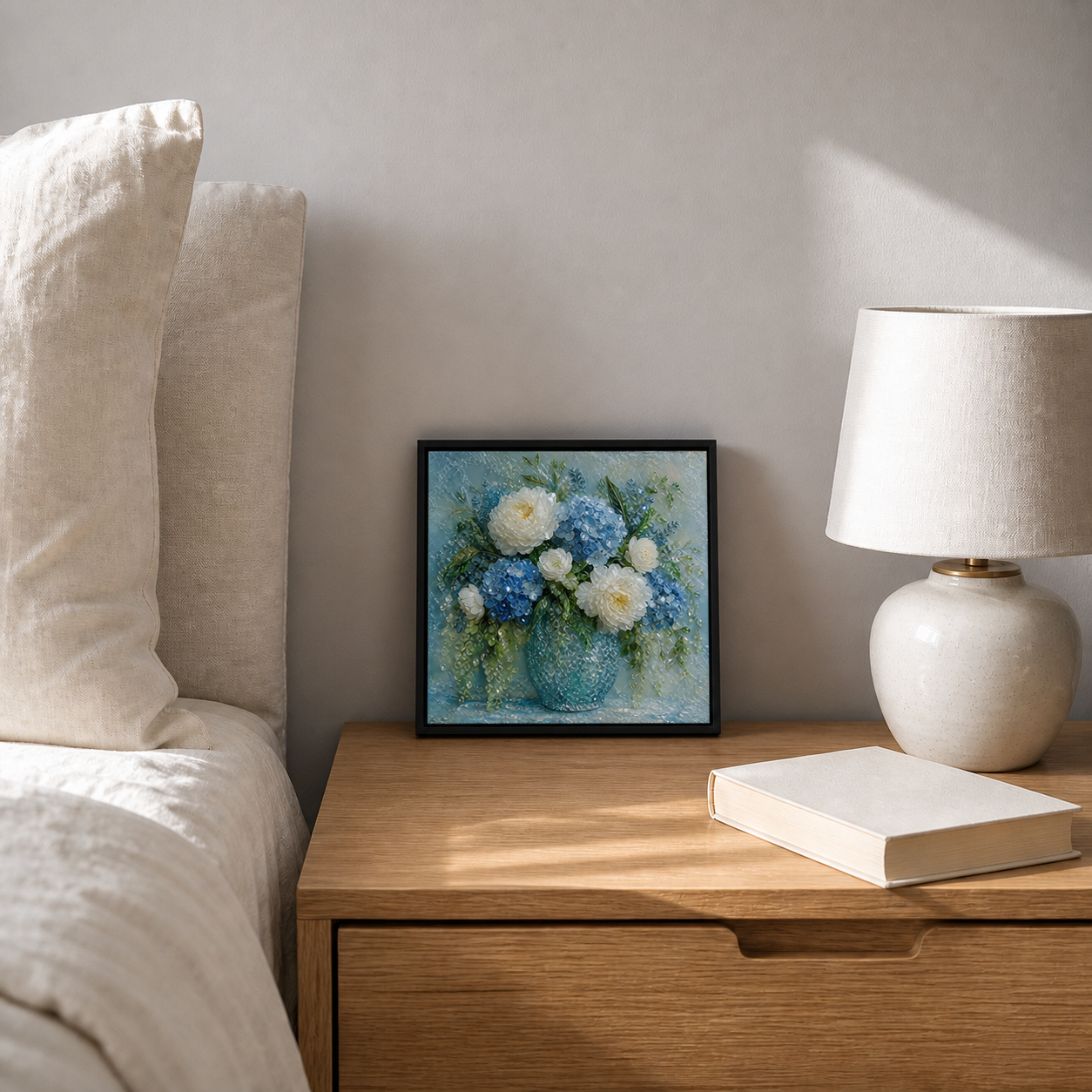 Blue Morning displayed on a bedside cabinet beside a warm lamp and neutral books.